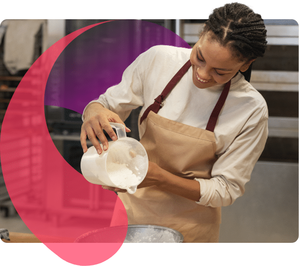 Catering staff preparing high quality school meals.